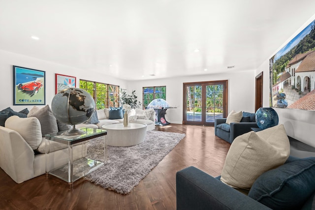 living room with hardwood / wood-style flooring and plenty of natural light