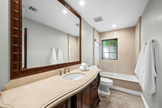 full bathroom featuring vanity, toilet, and tiled shower / bath combo