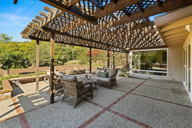 view of patio with a pergola and outdoor lounge area