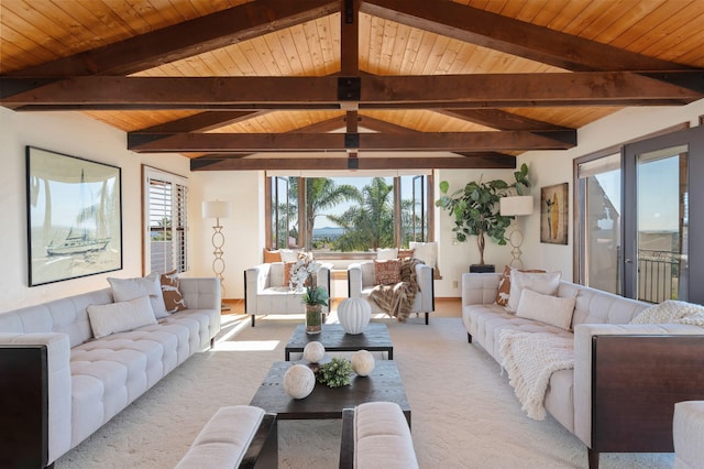 carpeted living room with wooden ceiling and vaulted ceiling with beams