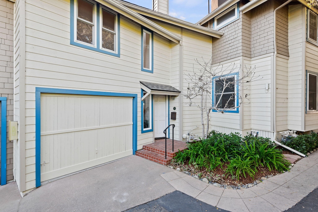 view of front of property with a garage