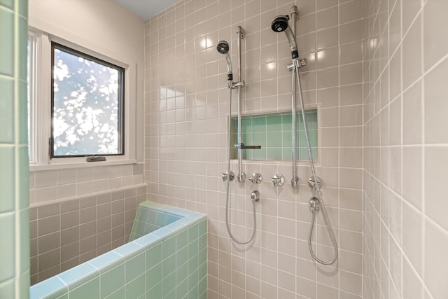 bathroom featuring a tile shower