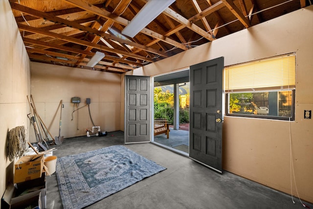 foyer entrance featuring concrete floors