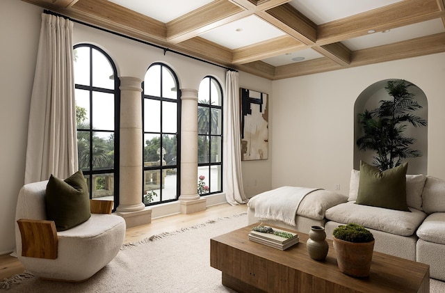 living room with beamed ceiling, a healthy amount of sunlight, decorative columns, and coffered ceiling