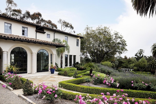 rear view of house with french doors