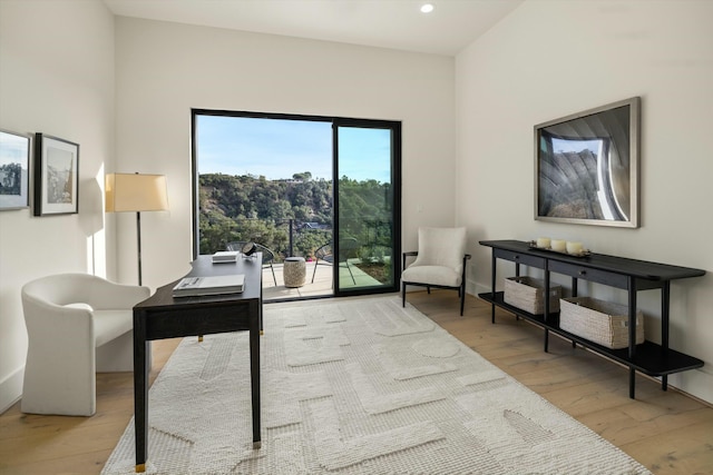 office featuring recessed lighting, light wood-style flooring, and baseboards