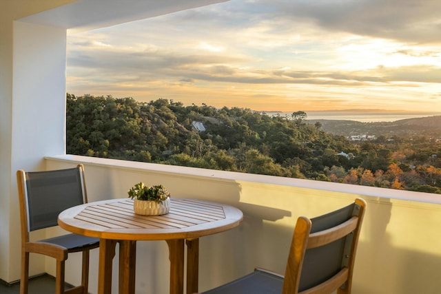 view of balcony at dusk