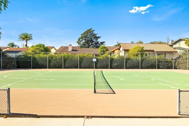 view of sport court featuring basketball hoop