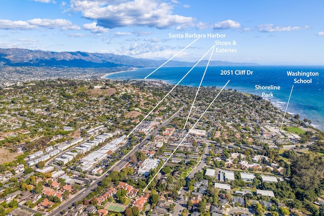 bird's eye view with a water and mountain view