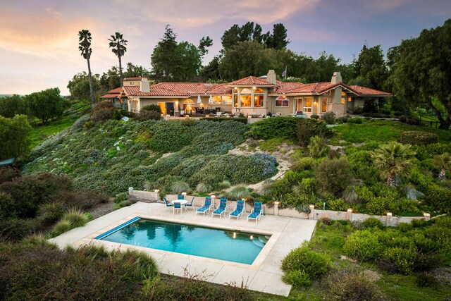 2408 Latigo Dr, Solvang, CA 93463 - back house at dusk with a patio area