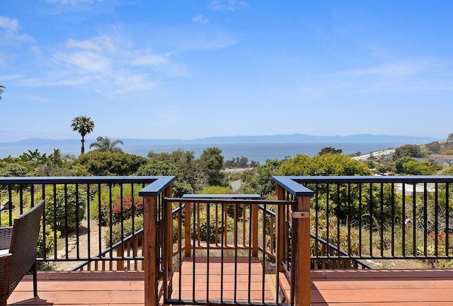 wooden terrace featuring a mountain view