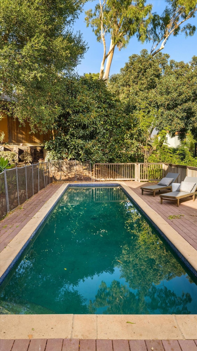 view of pool featuring a deck