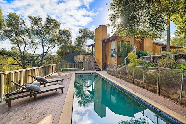 view of pool with a deck