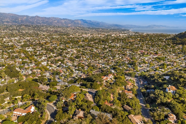 drone / aerial view featuring a mountain view