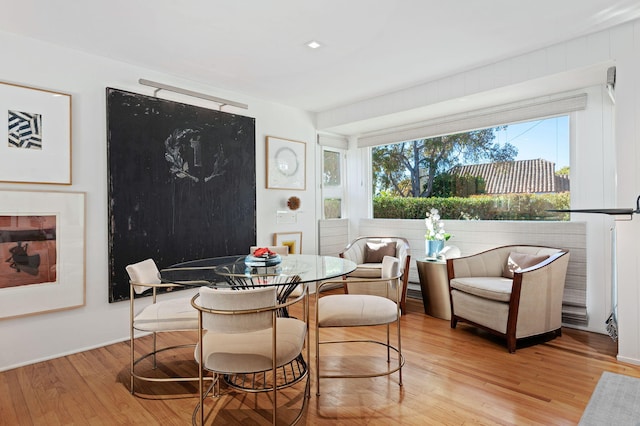 dining room featuring light hardwood / wood-style flooring