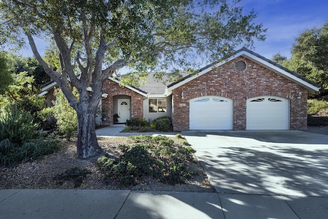 ranch-style home with a garage