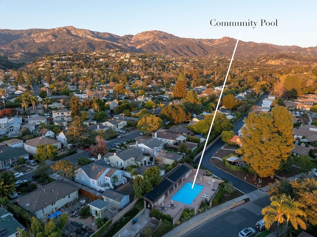 drone / aerial view featuring a mountain view