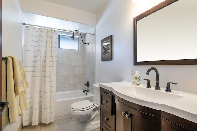 full bathroom featuring tile patterned floors, shower / bath combination with curtain, toilet, and vanity