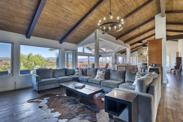 living room featuring beamed ceiling, a notable chandelier, wooden ceiling, and high vaulted ceiling