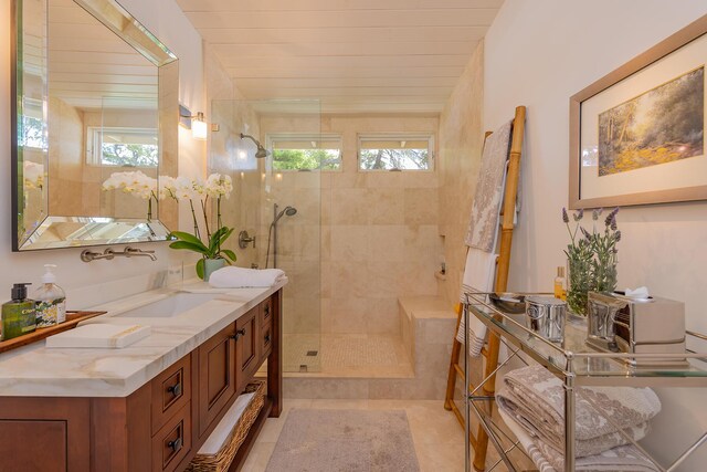 708 Cuyama Rd, Ojai, CA 93023 - bathroom with tile patterned flooring, vanity, wood ceiling, and tiled shower