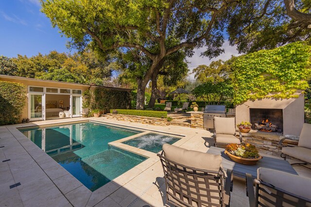 708 Cuyama Rd, Ojai, CA 93023 - view of swimming pool featuring a patio, an outdoor stone fireplace, and exterior kitchen