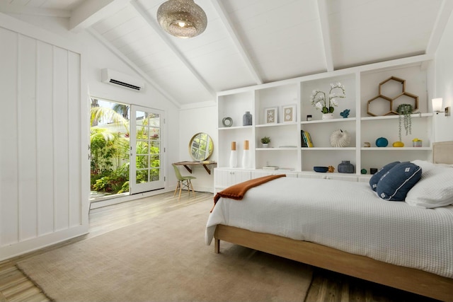 bedroom featuring a wall mounted air conditioner, vaulted ceiling with beams, and hardwood / wood-style flooring