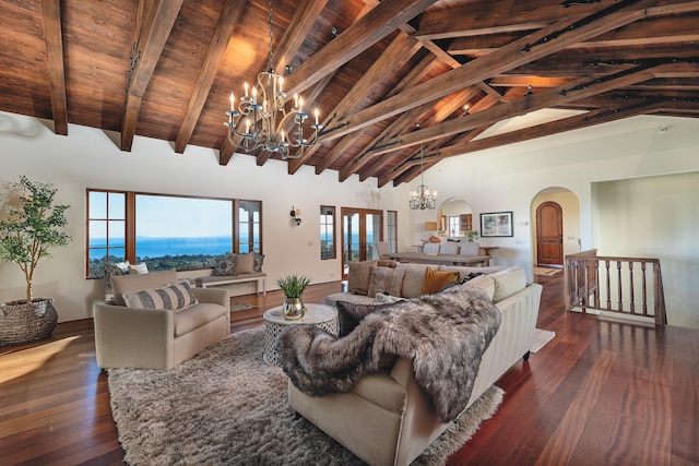 living room with dark wood-type flooring, a water view, high vaulted ceiling, wooden ceiling, and beamed ceiling