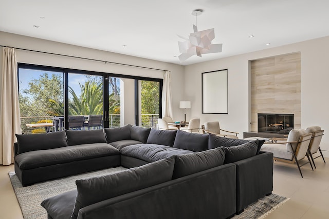 living room with a tiled fireplace