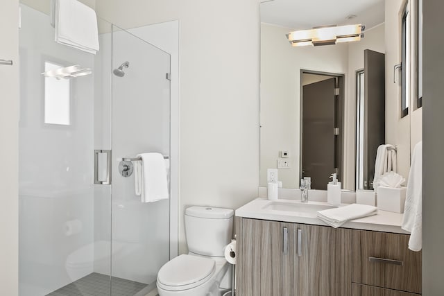 bathroom with vanity, toilet, a shower with door, and an AC wall unit