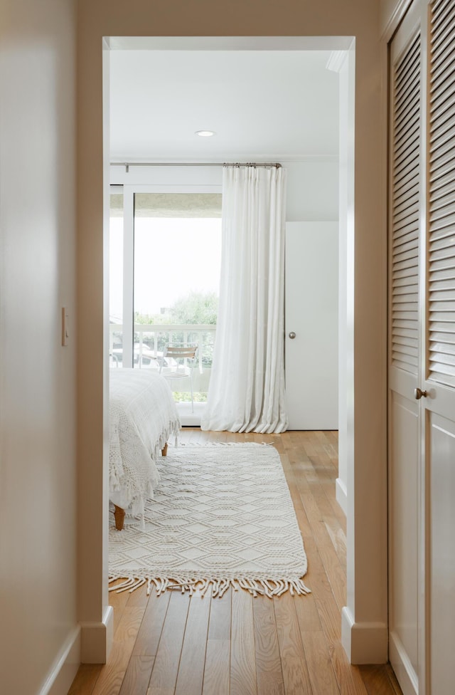 bedroom featuring light wood-type flooring