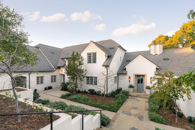 view of french country inspired facade