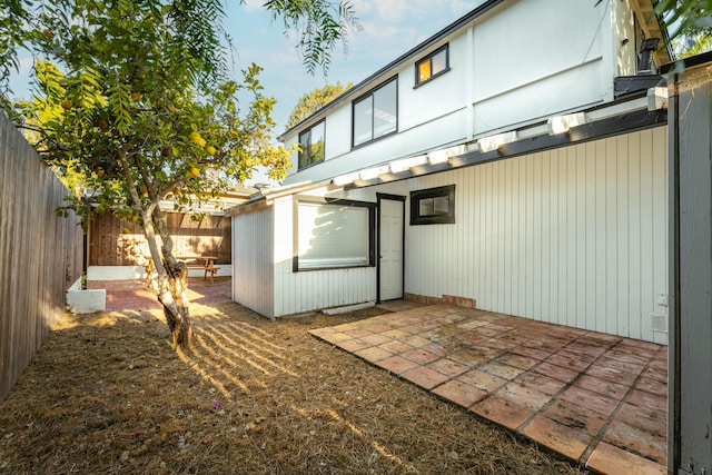 rear view of house with a patio area