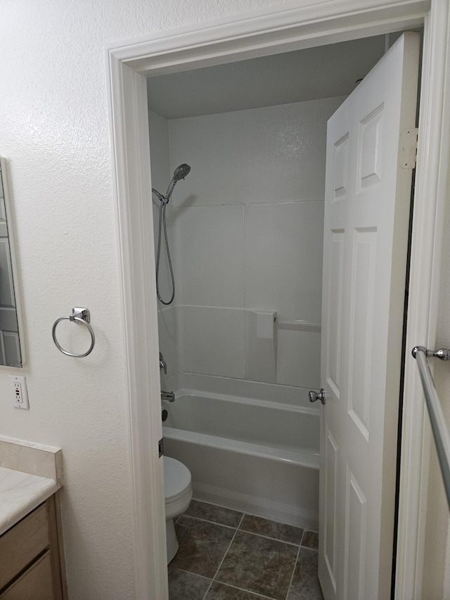 full bathroom featuring shower / tub combination, vanity, and toilet