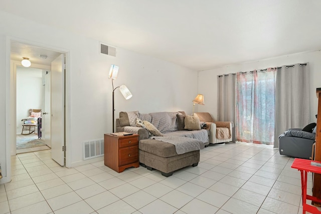 living room with light tile patterned floors