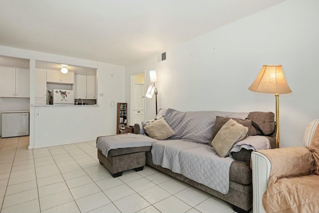 living room with light tile patterned floors