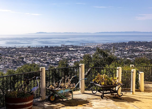 exterior space featuring a water and mountain view