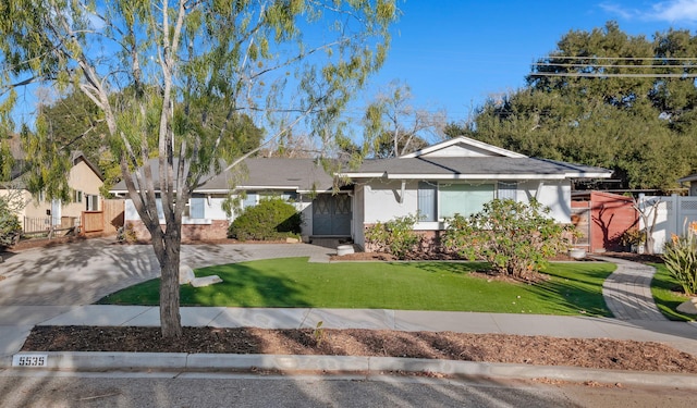 view of front of house with a front lawn