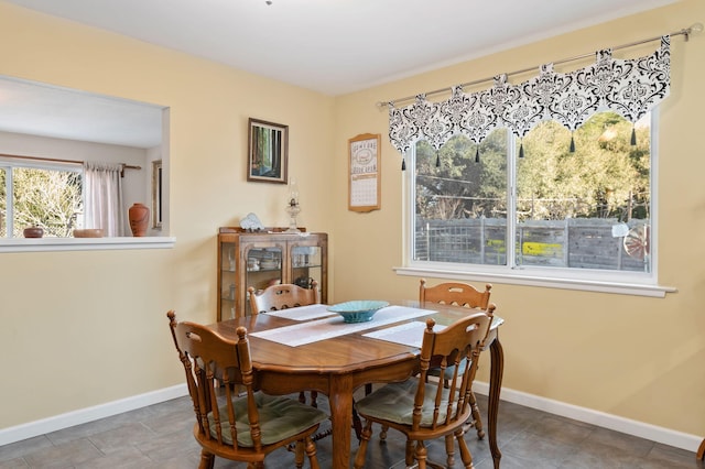 dining area featuring tile patterned floors