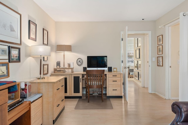 office space featuring light hardwood / wood-style floors