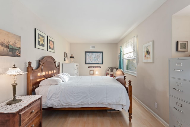 bedroom featuring light wood-type flooring