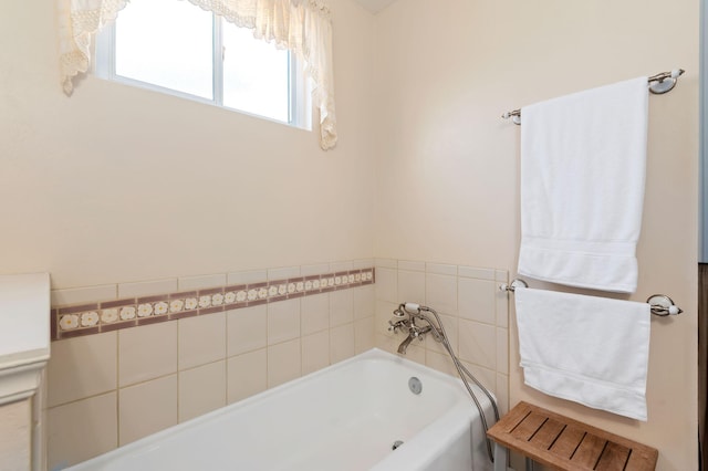 bathroom with a tub