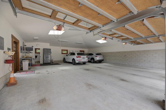 garage featuring a garage door opener