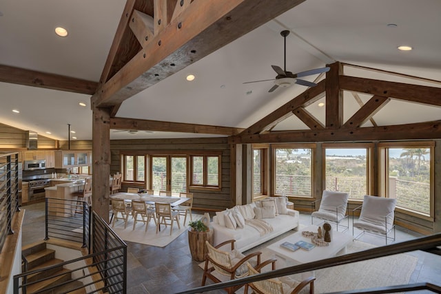 living room featuring ceiling fan, high vaulted ceiling, beam ceiling, and recessed lighting