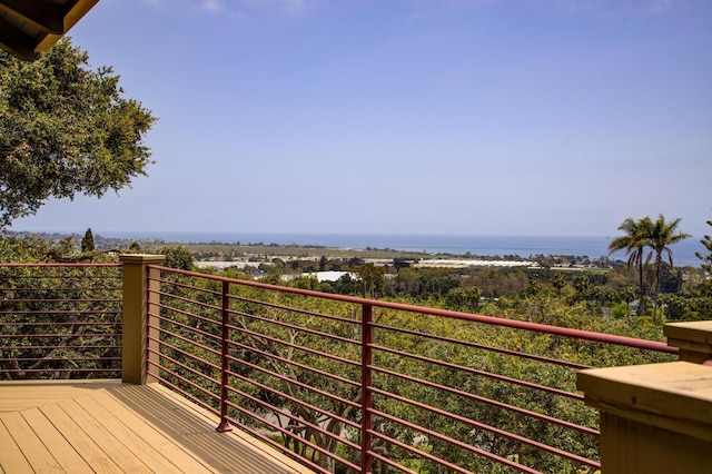 deck featuring a water view