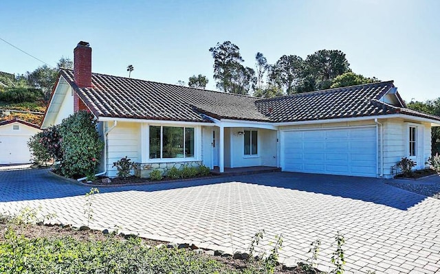 view of front of home with a garage