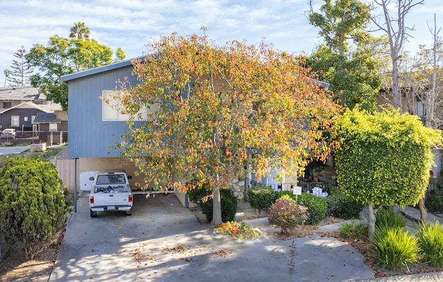 view of property hidden behind natural elements