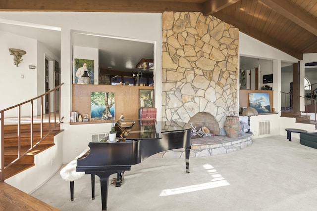 misc room featuring wooden ceiling, lofted ceiling with beams, carpet, and a stone fireplace