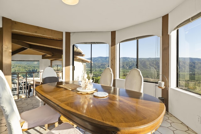 dining area featuring a mountain view