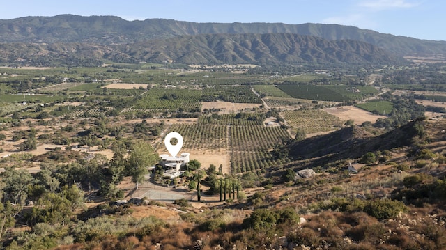 property view of mountains featuring a rural view