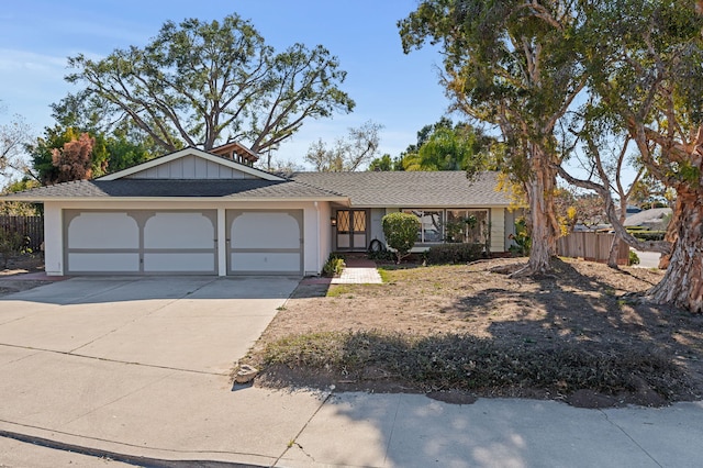 ranch-style home with a garage